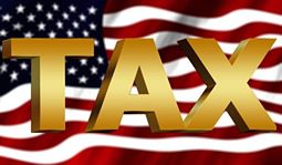 word tax over american flag